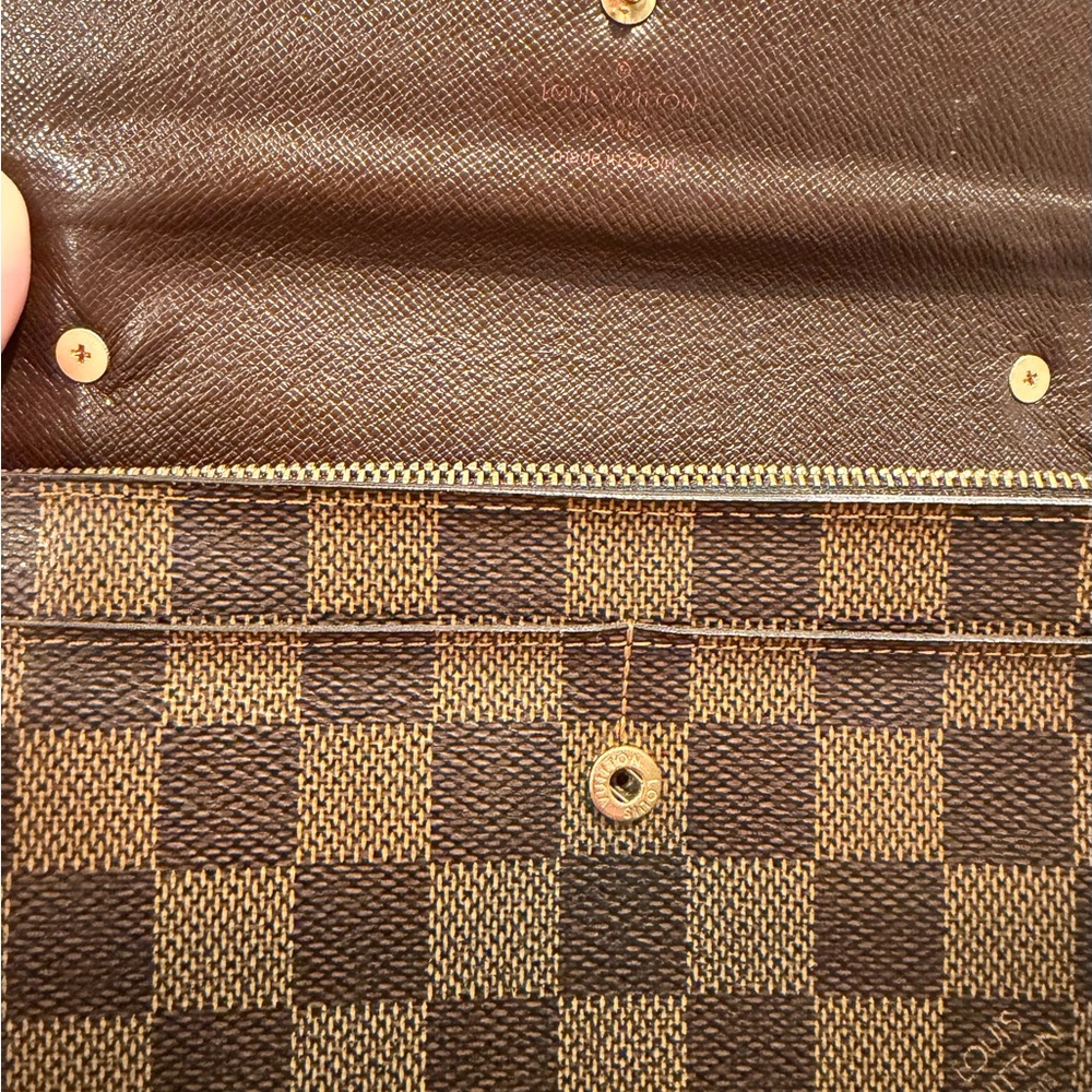 Louis Vuitton Brown Checkered wallet with added gold chain and acrylic chain